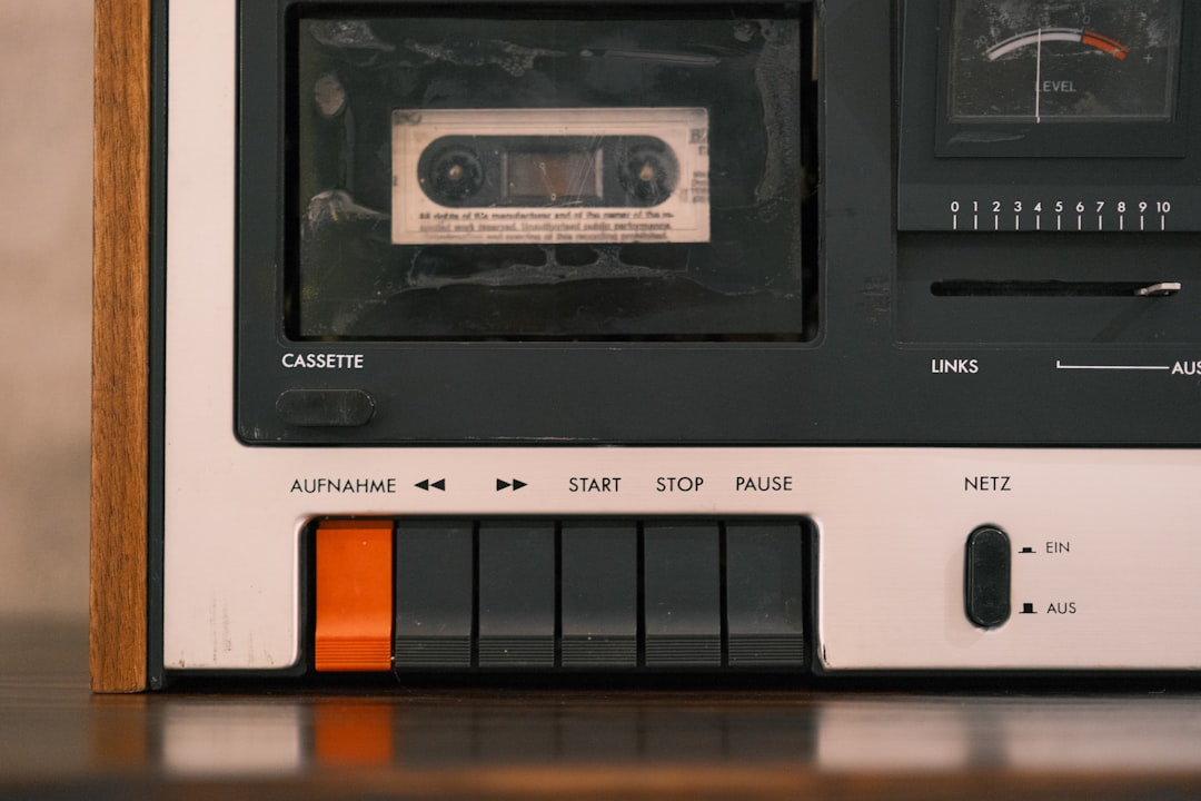 Vintage cassette player with retro audio buttons and display
